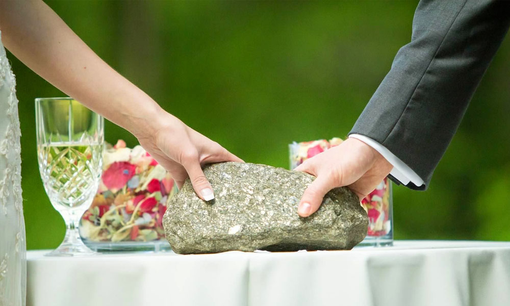 Image depicting the Stone Binding Ritual, a ceremony symbolizing strength and endurance in marriage, part of Ash Reynolds' unique ritual selections.